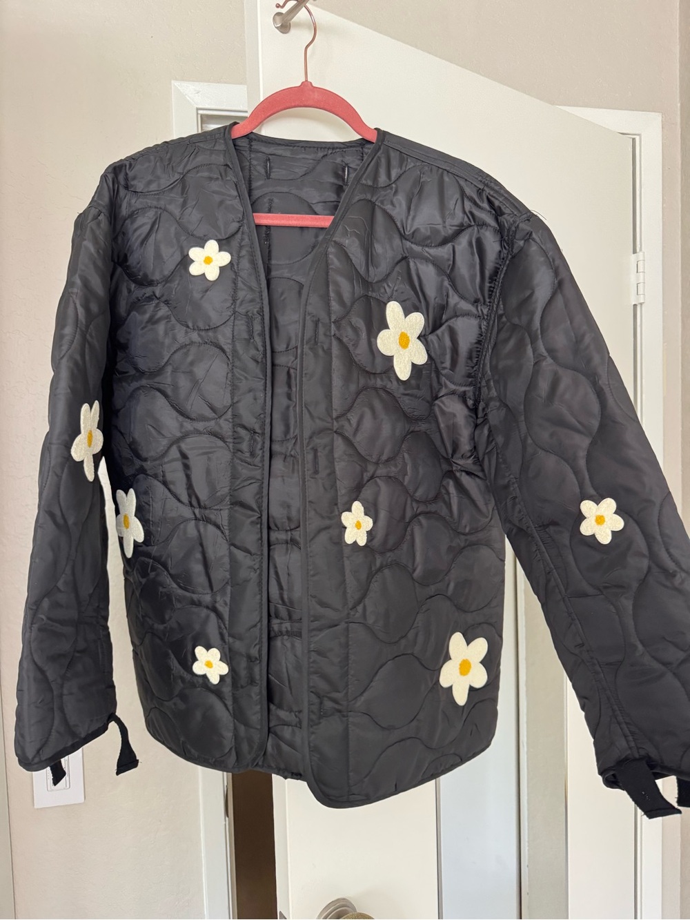 BAMABONES black liner jacket with chenille daisy appliqués. NWOT